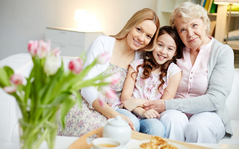 a young family enjoying afternoon tea, family trip, August 2024, UK